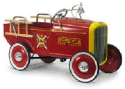 Little red ride on toy a fire truck with a bell and little ladders